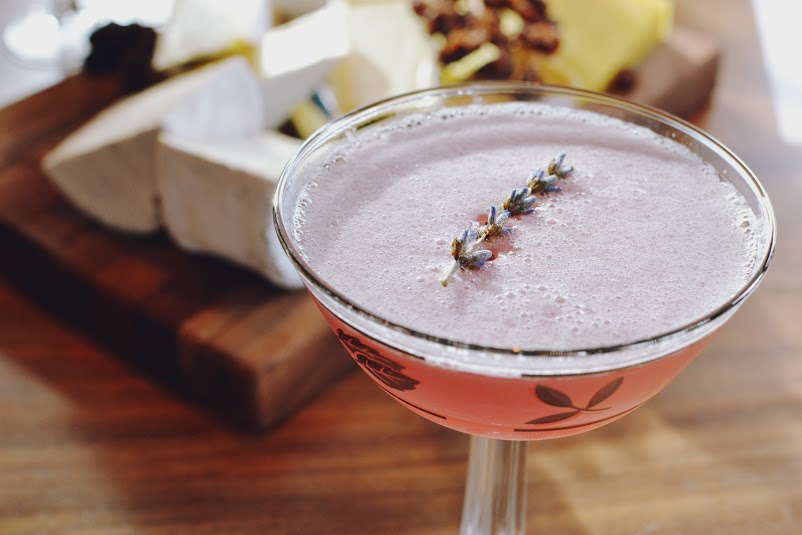 Homemade lavender spiked gin, maraschino liqeur, crème de Violette, fresh pressed lemon juice served straight up in a vintage coupe with candied lavender