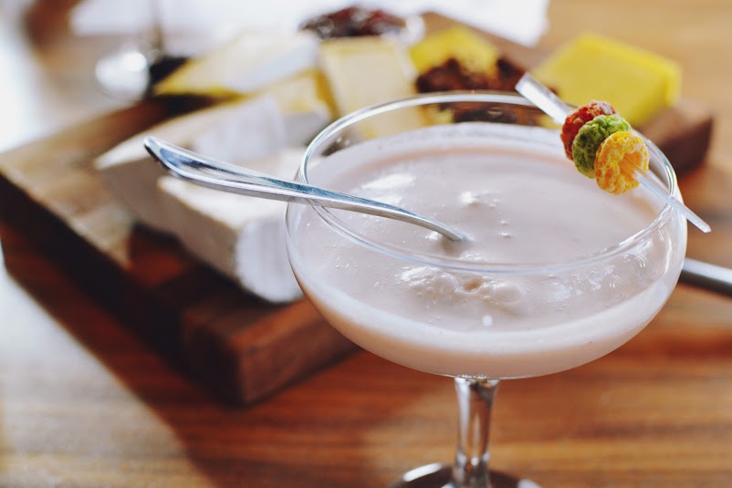 Fruit Loop infused vodka, Cointreau, coconut syrup, pineapple juice, fresh pressed strawberry 