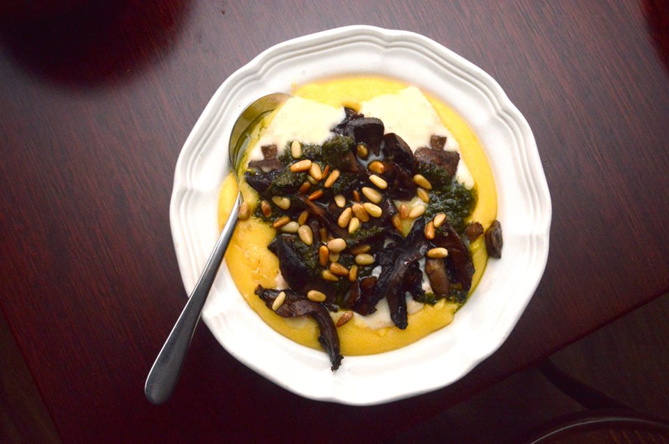 Polenta with Sauteed Mushrooms. Taleggio Cheese, Basil Pesto and Pine Nuts