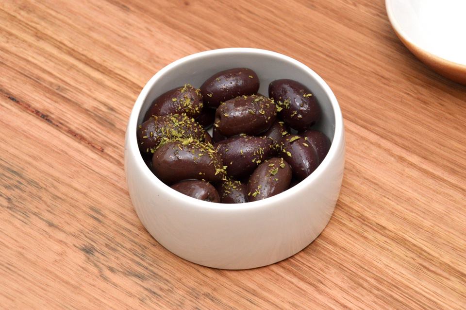 Local Kalamata Olives, oregano, citrus zest, garlic