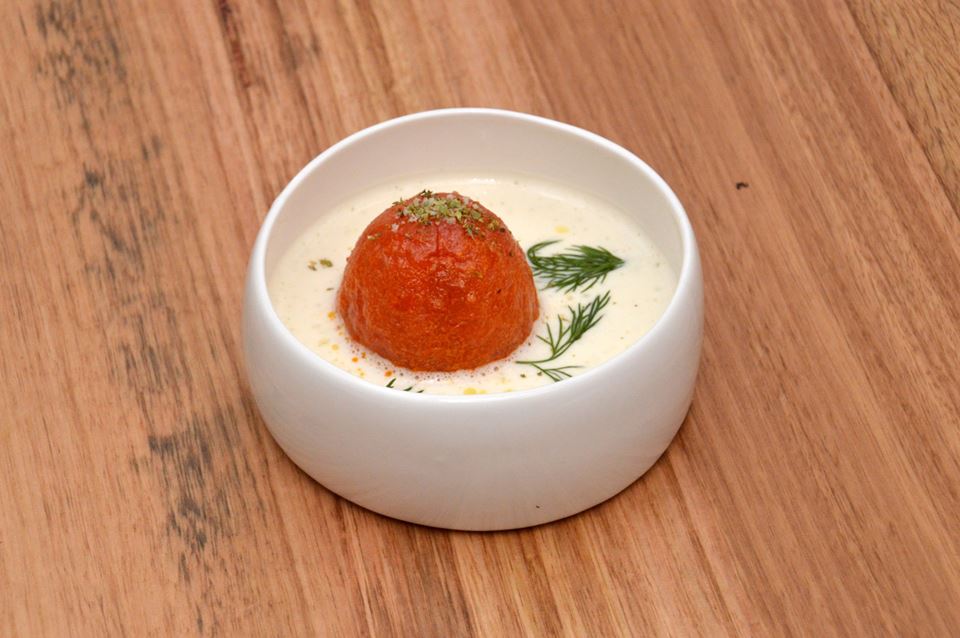 Gemista: Rice stuffed tomato, kefalotyri cheese foam, mint, dill