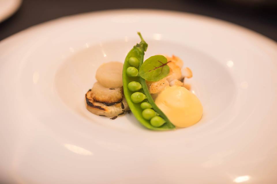 Lobster Medallion with Sichuan Hollandaise, Peas, Jerusalem Artichoke in Chilli Xiaoshing Broth